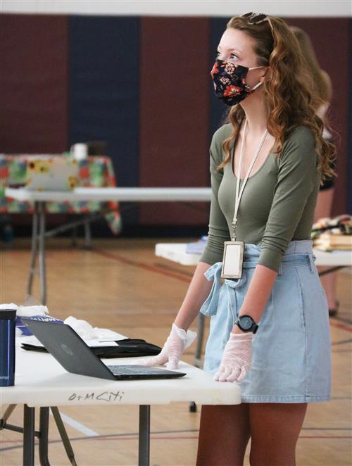 Holly McCarty, a Pulaski Academy & Central School District student, awaits direction on a virtual registration process 